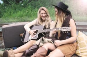 two-girls-playing-guitar